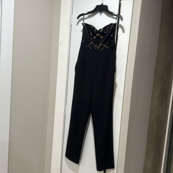 Express sequin top jumpsuit
Size 2 - Picture 1 of 3